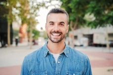 Patient smiling after a professional dental cleaning